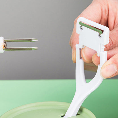 Vielseitiger Obstschäler mit Stretchstruktur und Handkurbel